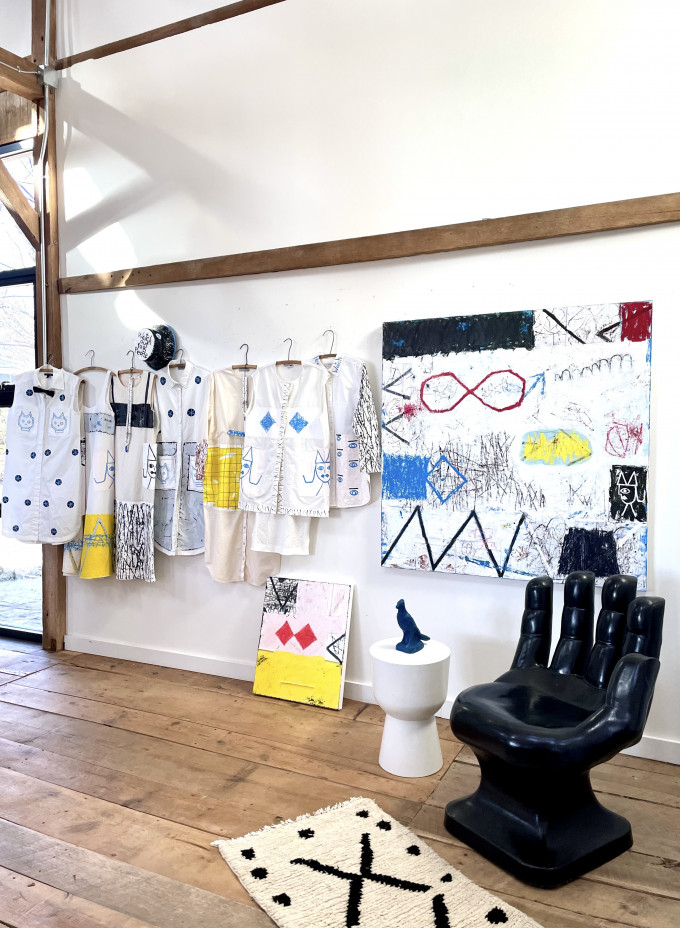 Studio Shot with Hand Painted Garments and Paintings